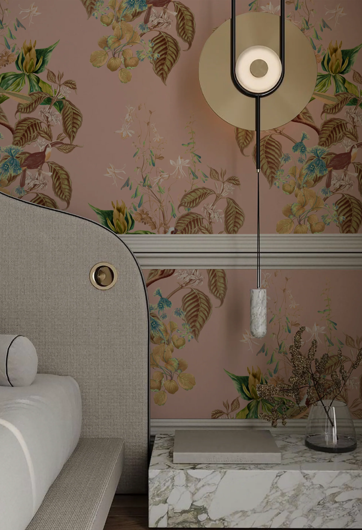 A couch with a modern table adorned with a lamp, surrounded by Deus ex Gardenia's Aviary Isle Luxury Botanical Wallpaper in Cinder Rose Pink. 
