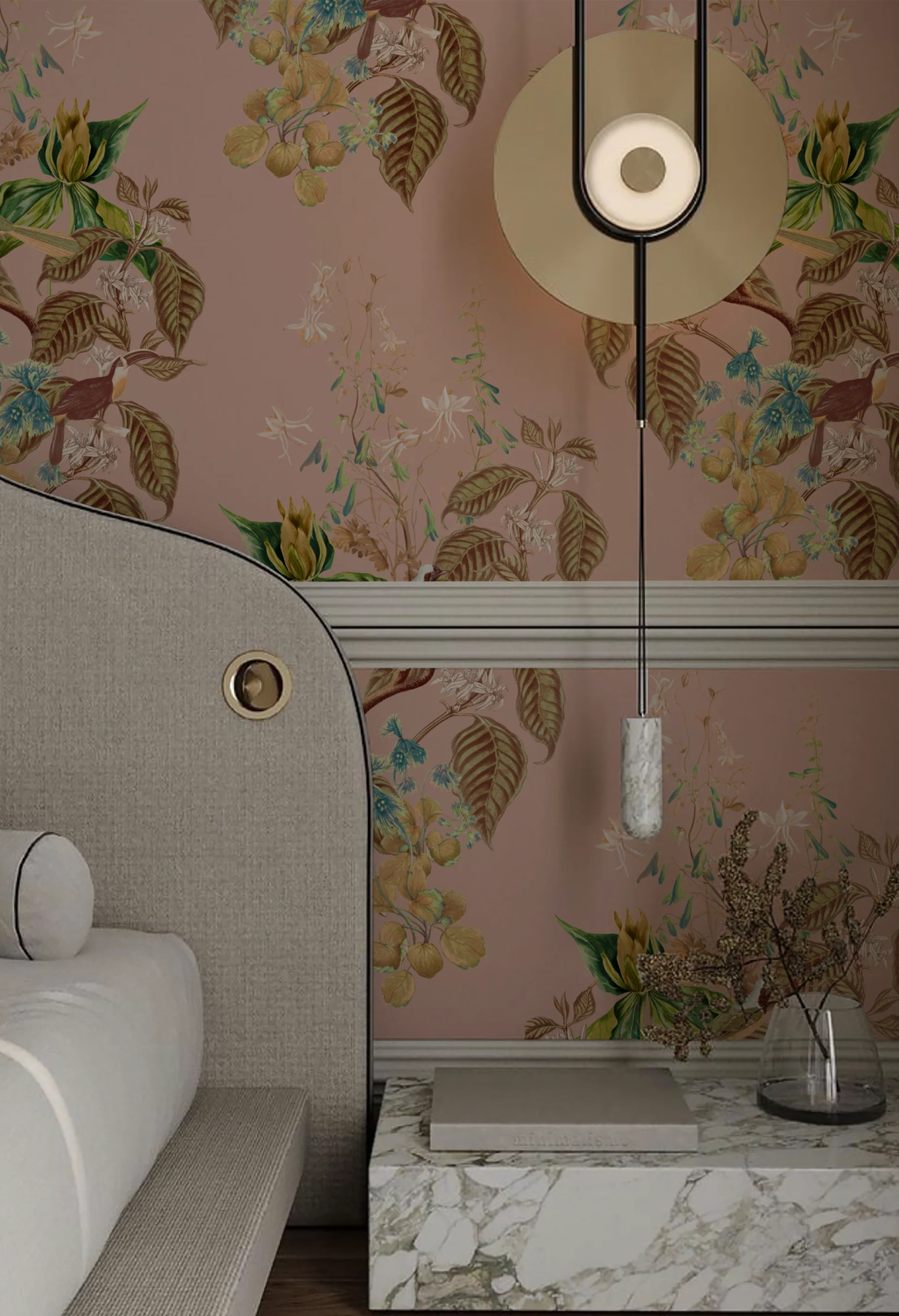 A couch with a modern table adorned with a lamp, surrounded by Deus ex Gardenia's Aviary Isle Luxury Botanical Wallpaper in Cinder Rose Pink.