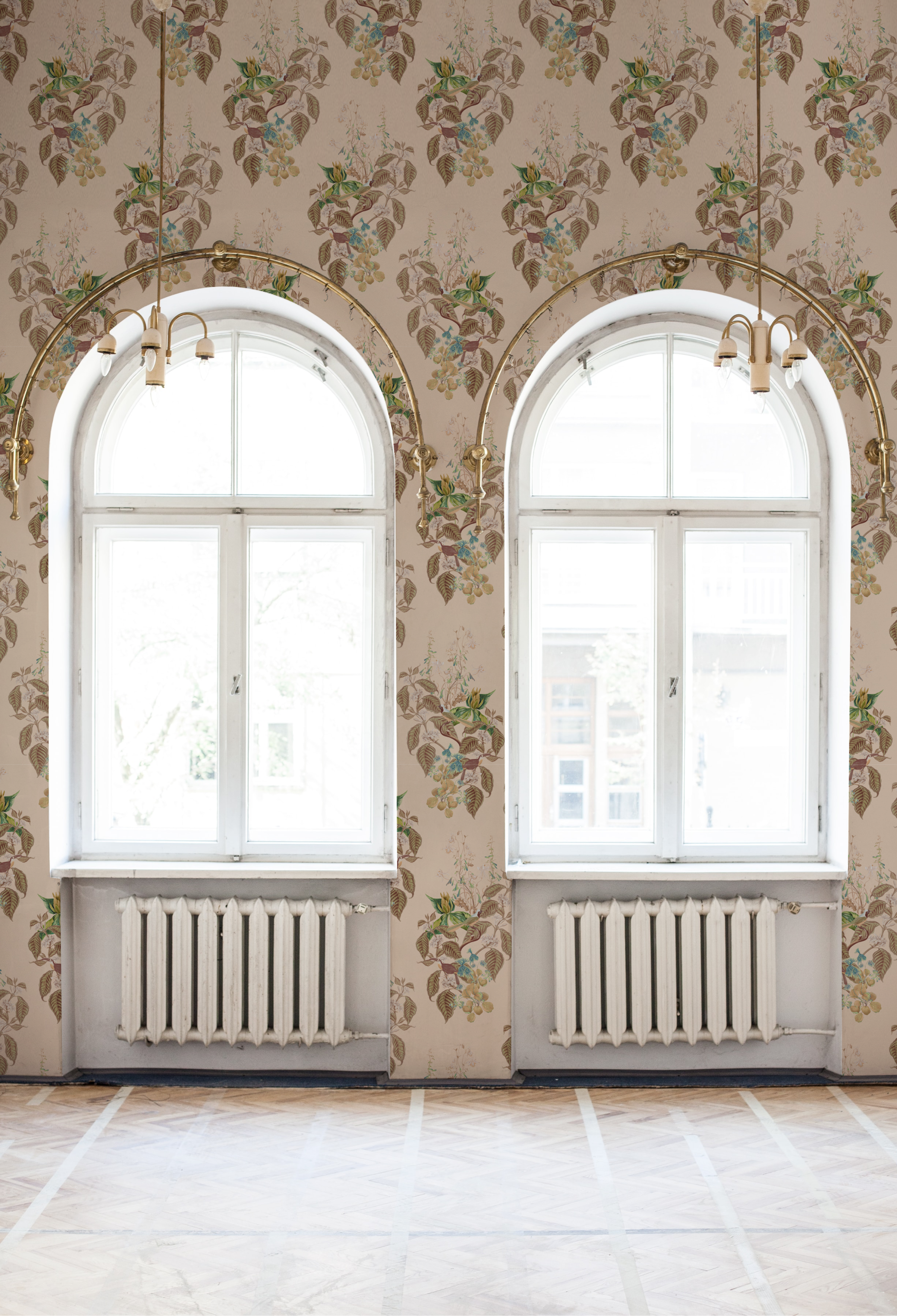 Two large windows surrounded by luxury Aviary Isle Wallpaper in Ecru by Deus ex Gardenia. Photo by Katie Luka.