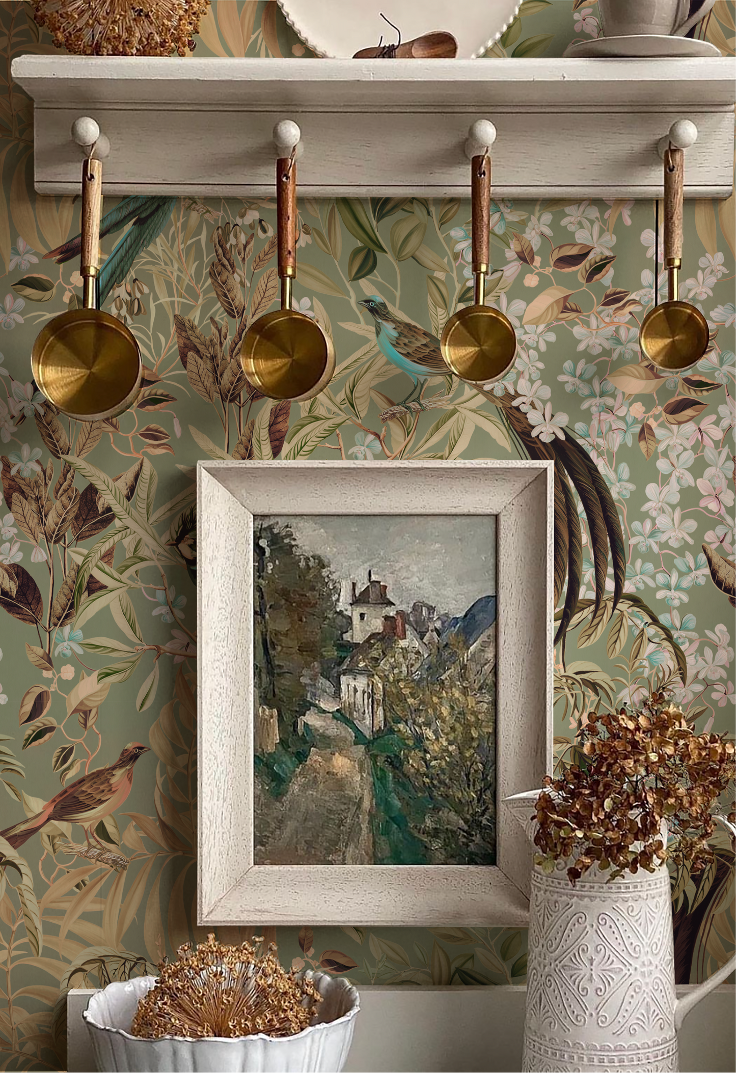 Framed painting of art in kitchen cabinet with botanical green 'Deus ex Gardenia's' Resplendent Woods Wallpaper in Willow. Photo by The Introverts Home.