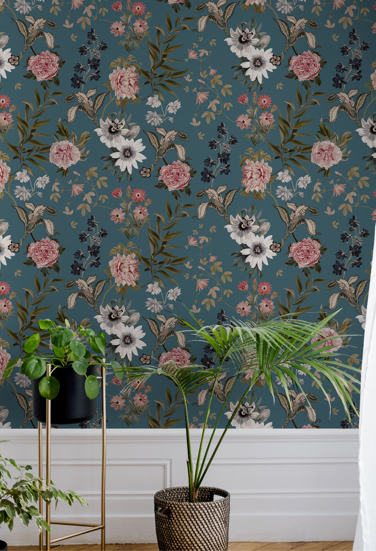 A room with plant pots and wallpaper on a wall from Deus ex Gardenia of Beechcroft Garden Collection in Cerulean of florals on a blue background. Photo by Filipp Romanovski