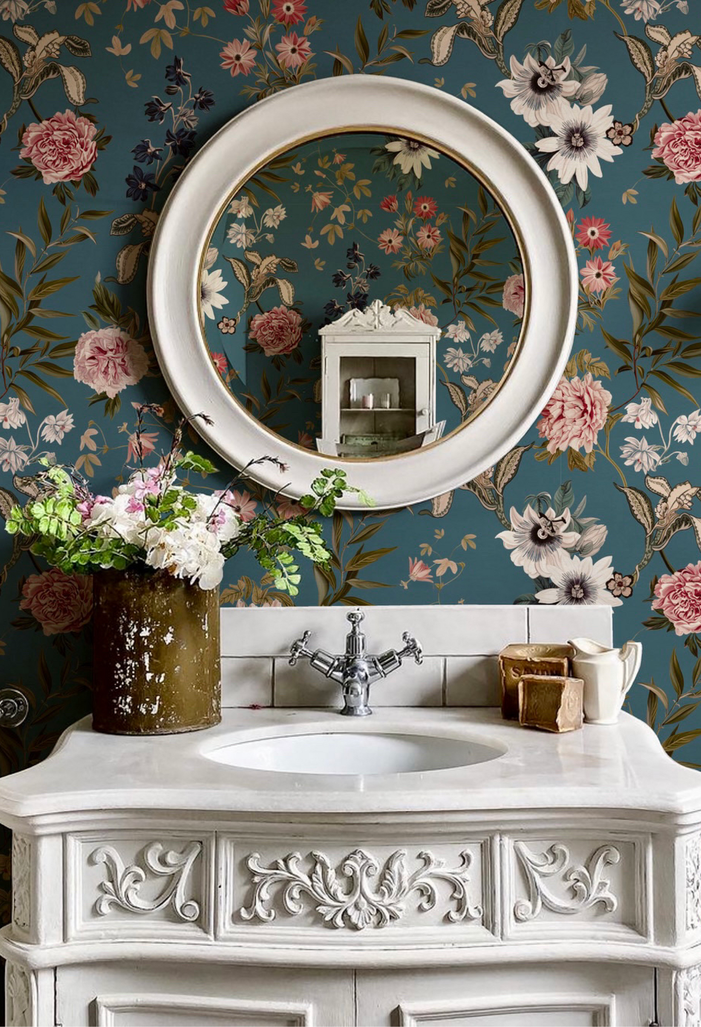 Luxury bathroom with mirror reflecting blue floral Beechcroft Garden Wallpaper in Cerulean on the walls from Deus ex Gardenia. Photo by The Introverts Home