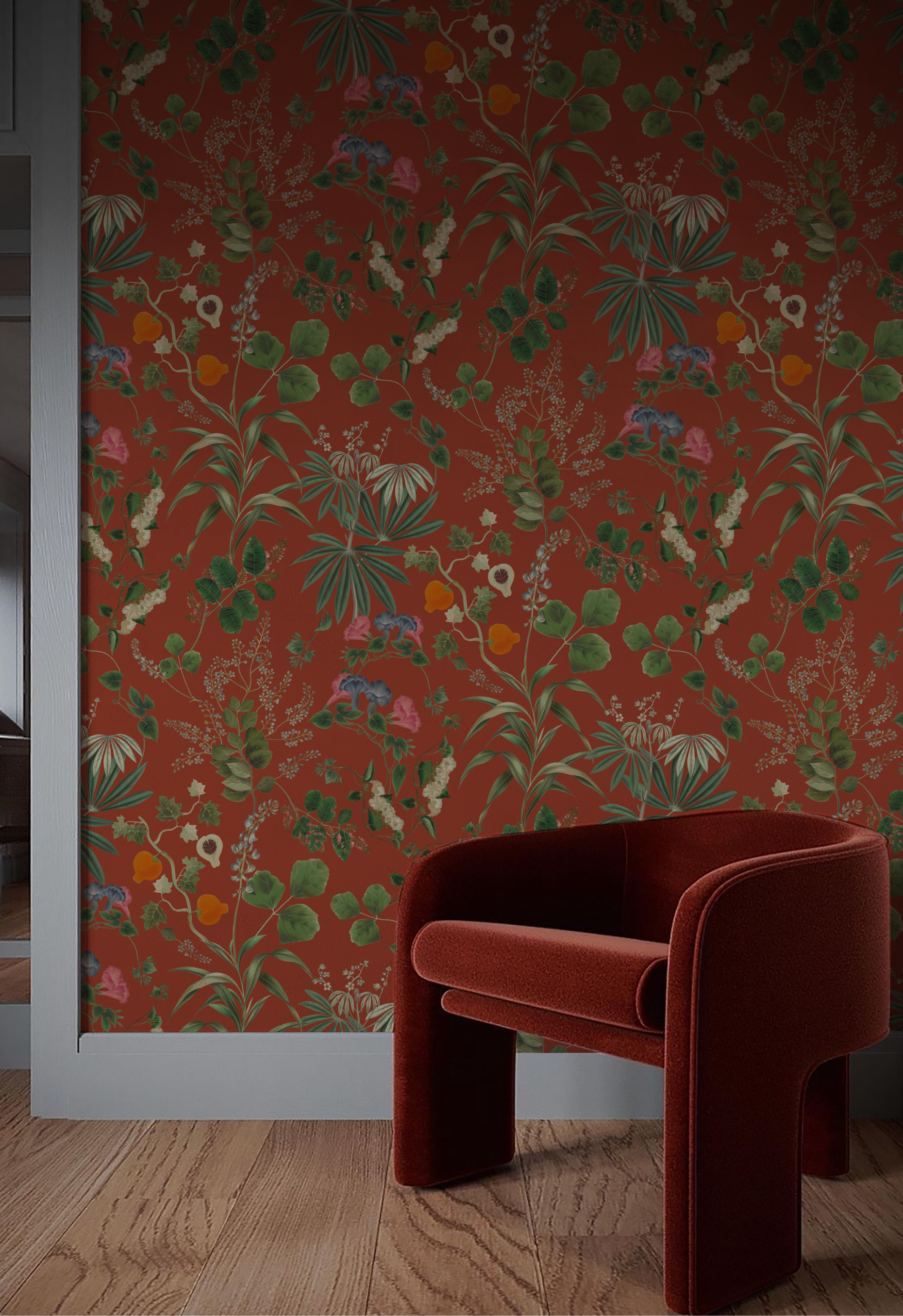 Red chair in a room with Orange floral wallpaper of Eden in Marigold by Deus ex Gardenia.