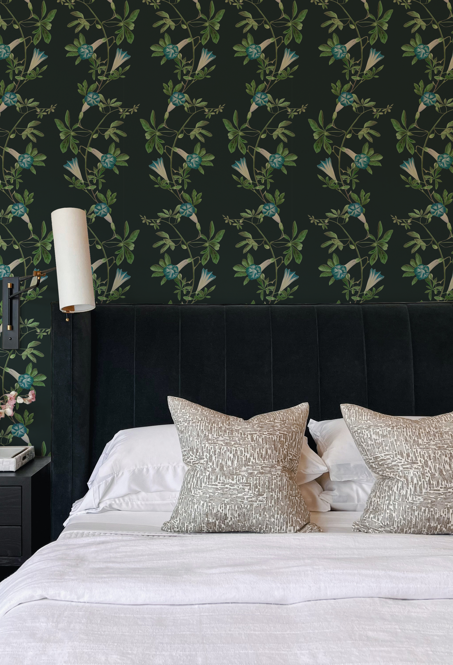 A luxury bedroom with blue floral vine pattern on a black background wallpaper of Midsummer in Charcoal by Deus ex Gardenia. Photo by MK-S.