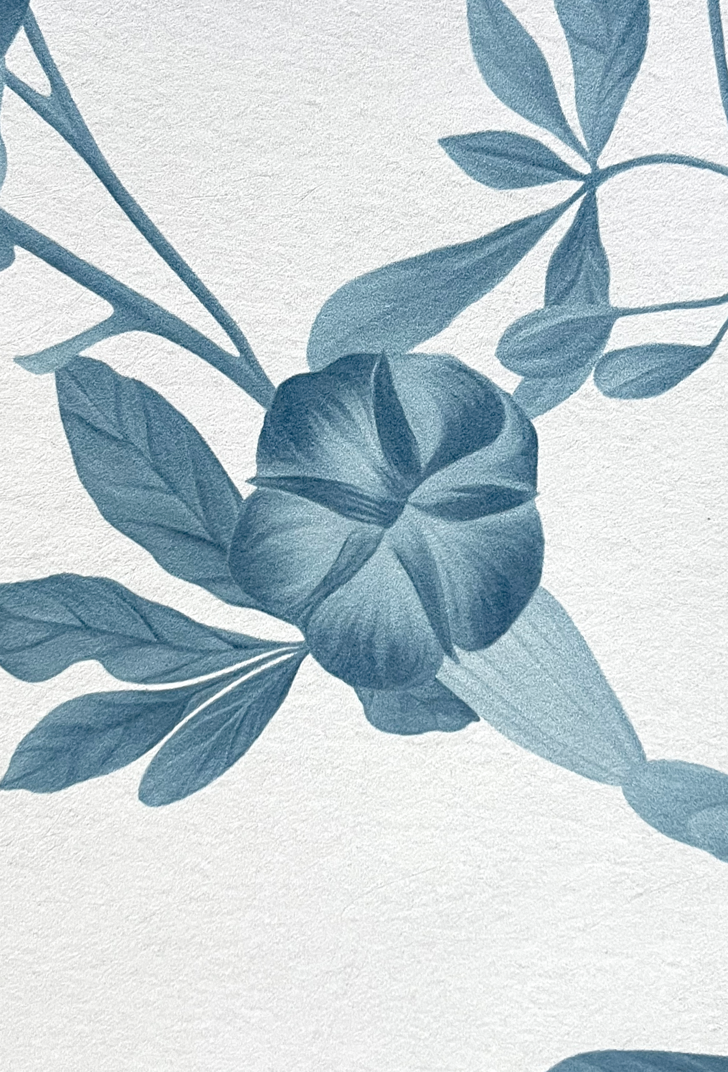 Close up of a blue flower designed by Deus ex Gardenia featuring the Midsummer Luxury wallpaper in Iris.
