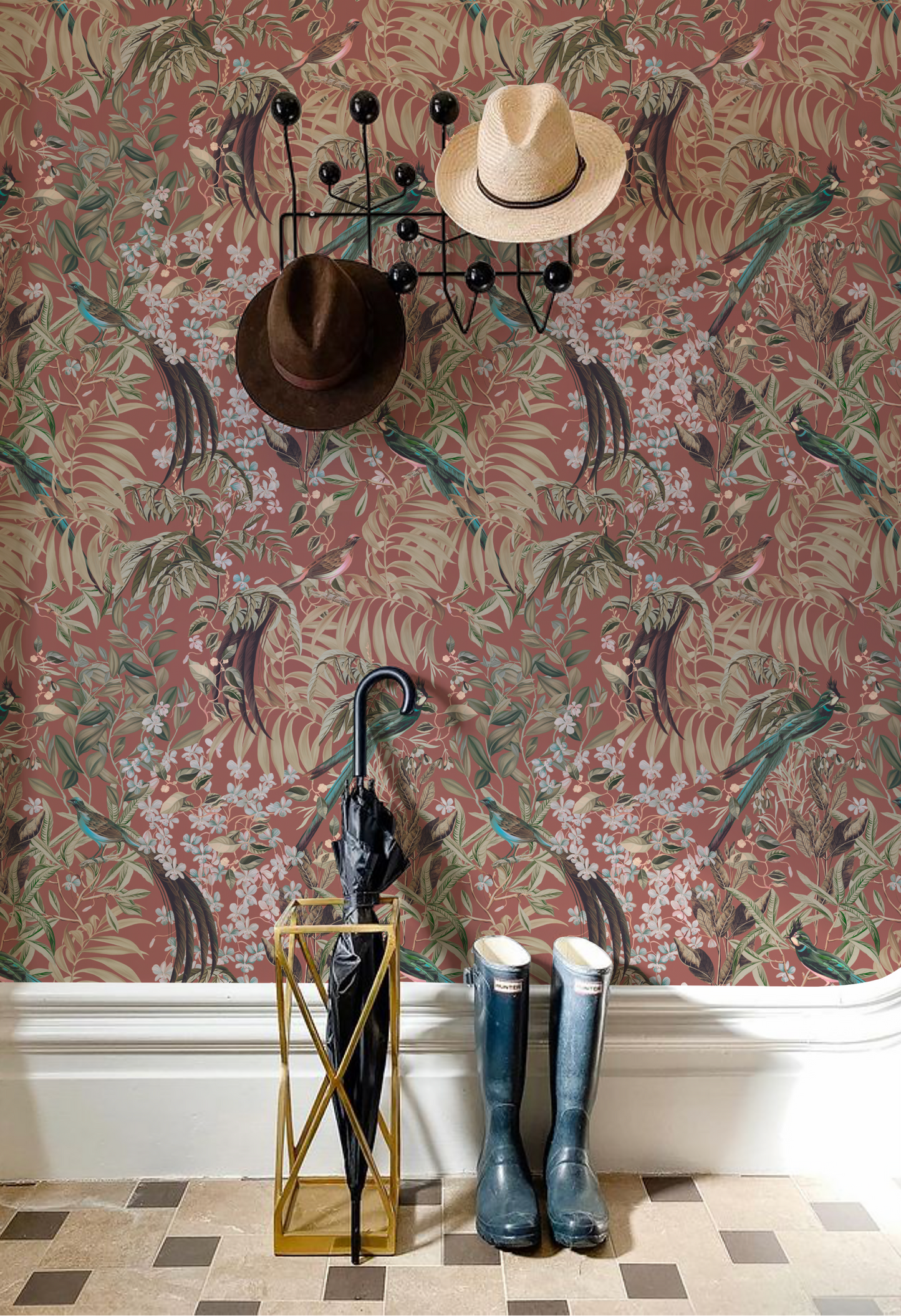 Hallway in Manor House with hanging hats and shoes surrounded by Deus ex Gardenia's Resplendent Woods Botanical Wallpaper in Terracotta. Photo by Readmore House Interiors.